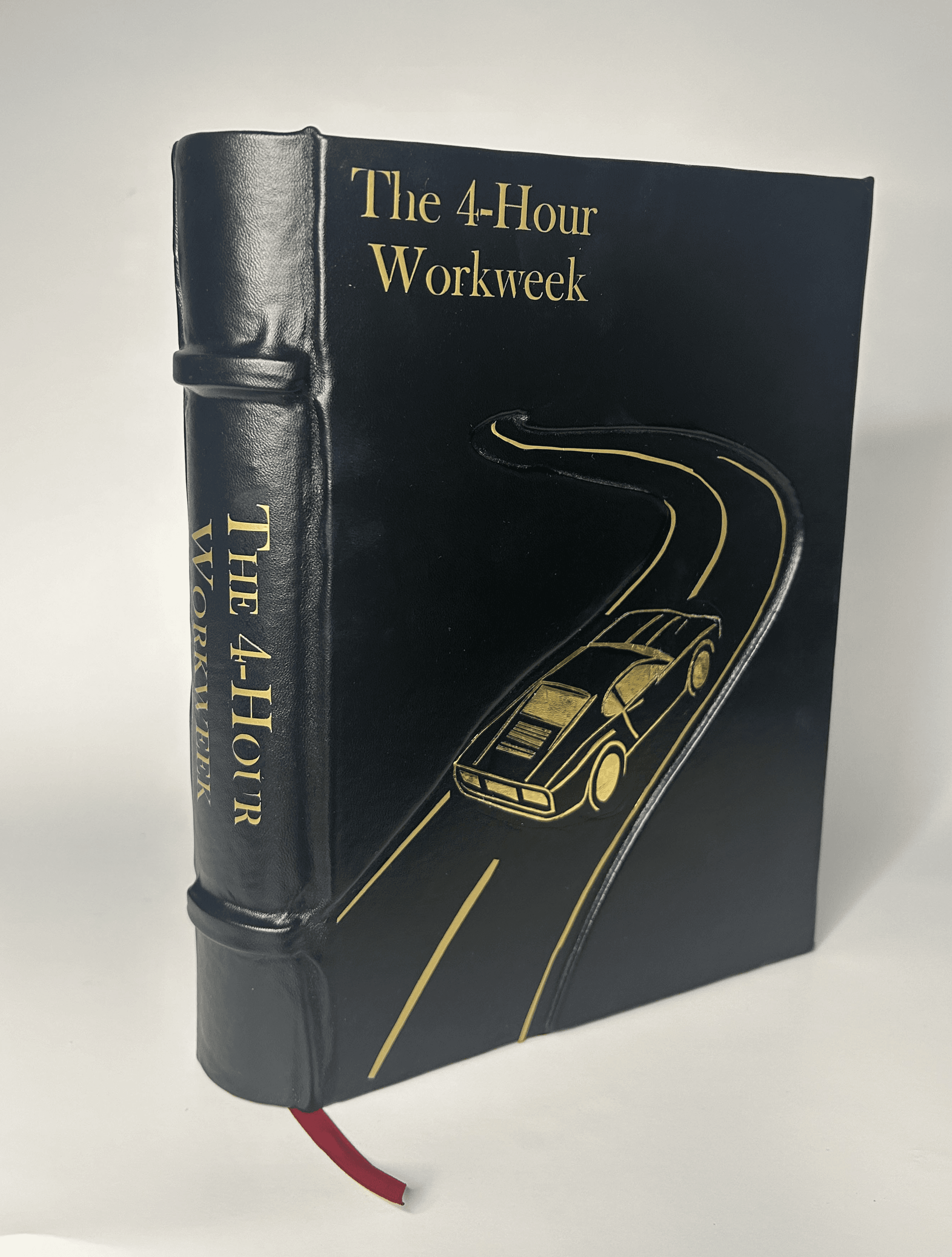 After: The 4-Hour Workweek leather-bound with gold Lamborghini design